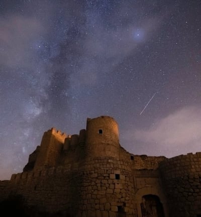 brown concrete building under starry night